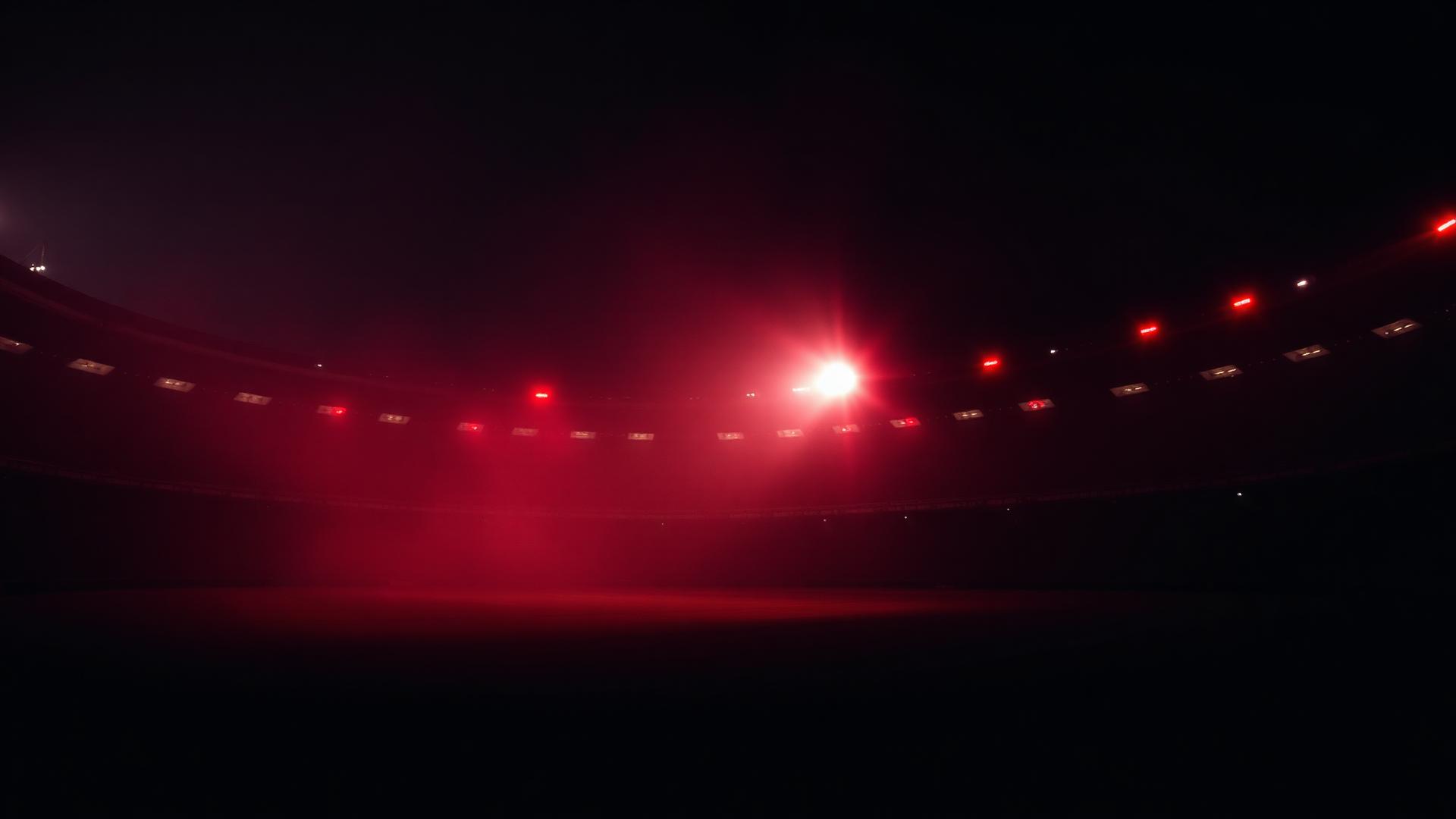 Stadio illuminato di rosso